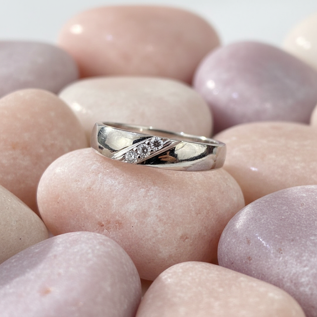 Diagonal Diamond Ring on Pastel Rocks