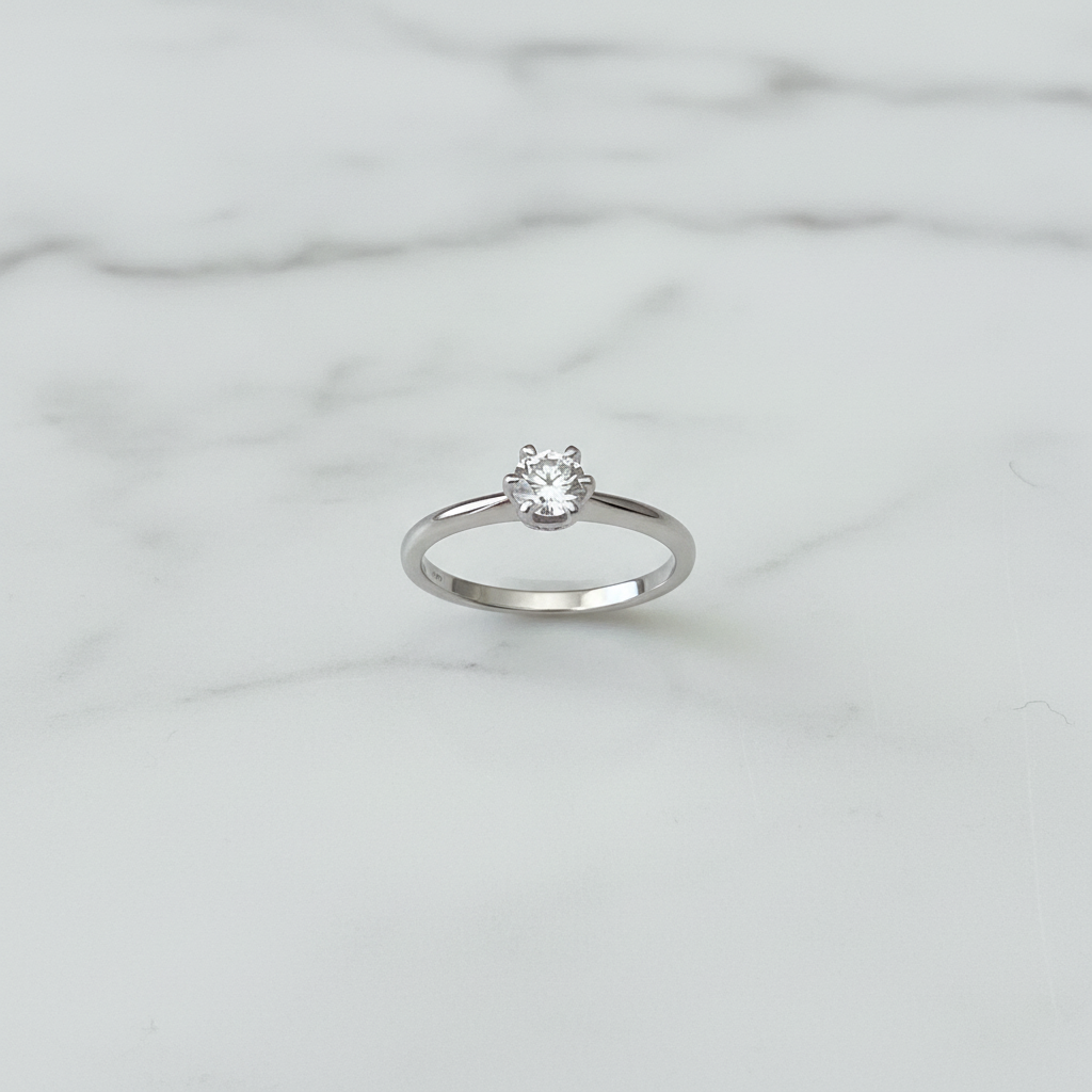 Solitaire Diamond Ring on Marble