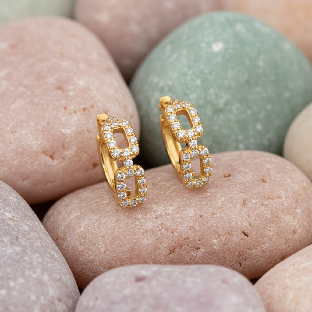 Yellow Gold Diamond Chain Hoops on Pastel Rocks